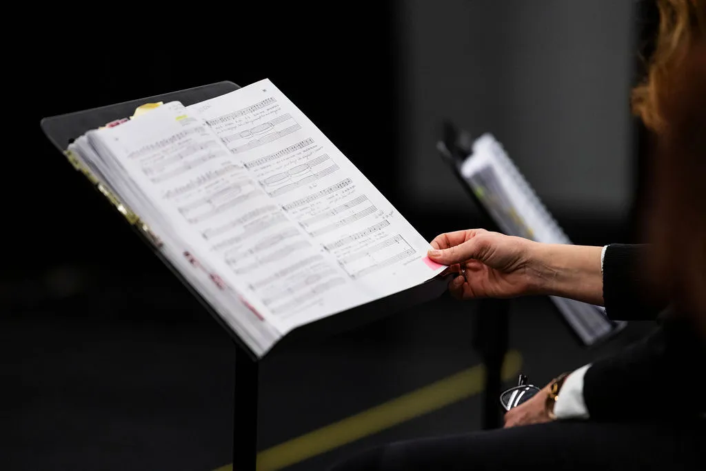 Annette Weber is turning the page of a score